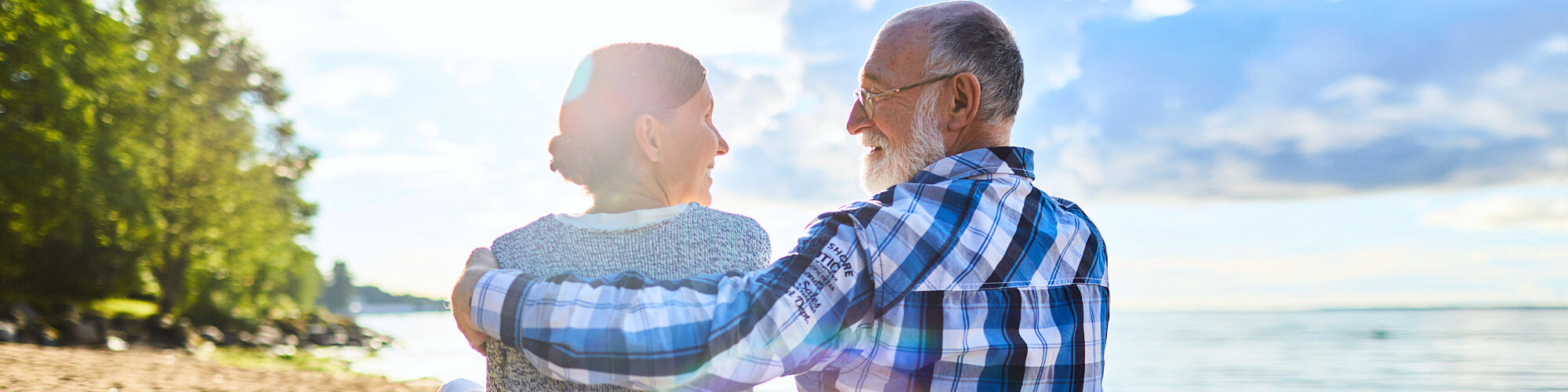 erderly couple beside the sea shore
